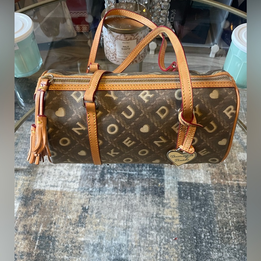 Dooney & Bourke (rare!!)
Barrel Brown/Tan/Cream Color Writing (Coffee) duffle - Picture 1 of 10